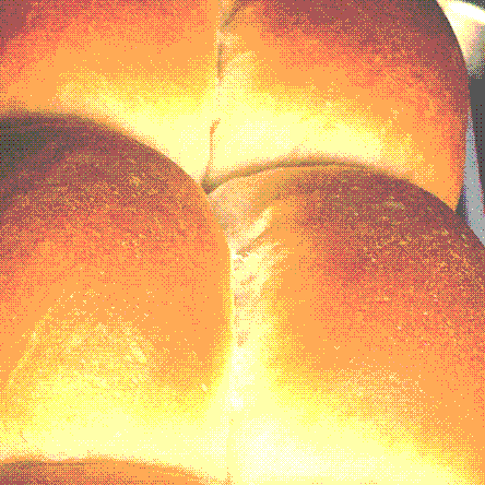 closeup photo of freshly baked buns still in the pan. the texture looks perfect. you can almost smell them through the camera.